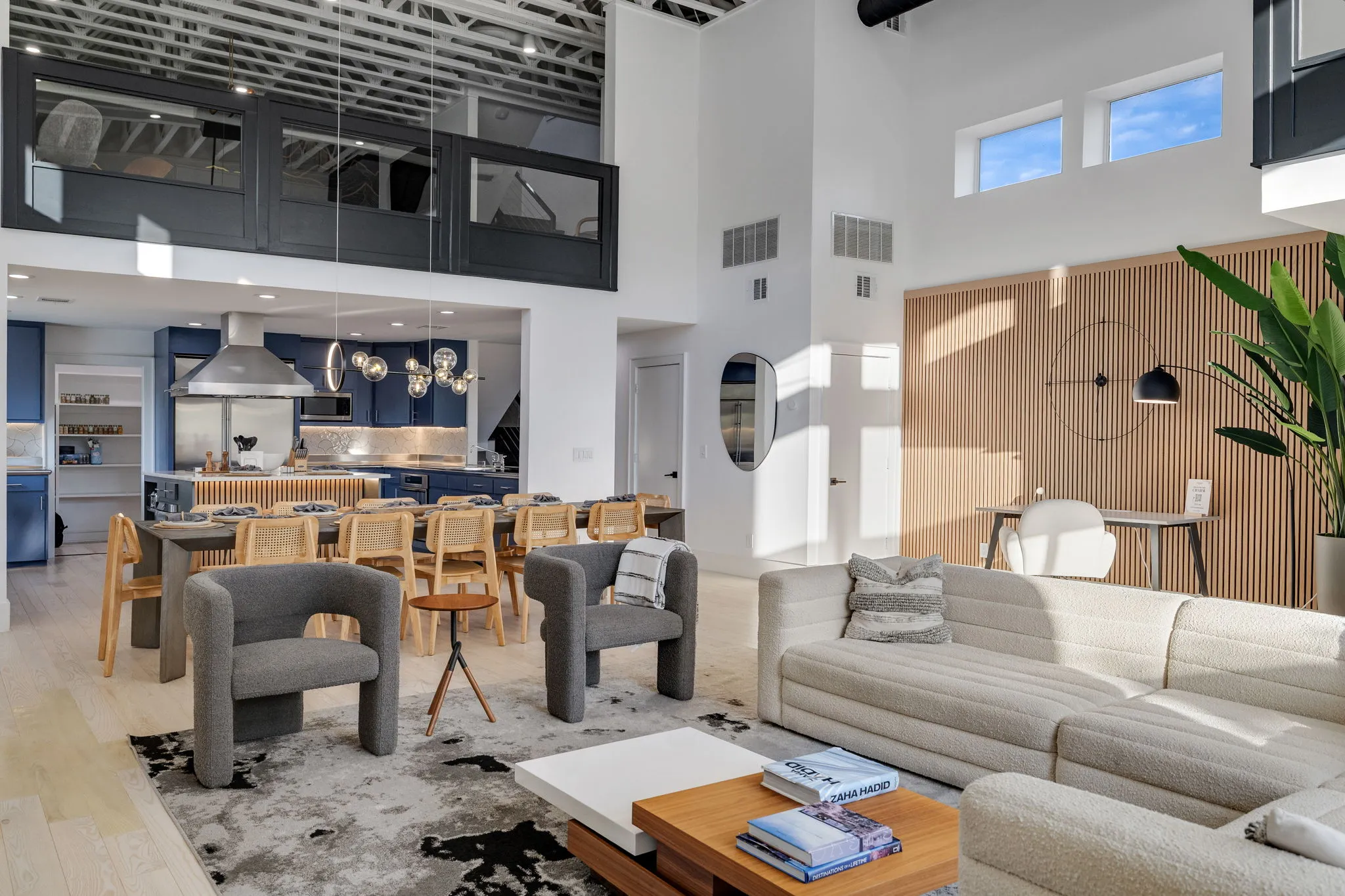 Ellum House main living area with sectional sofa and city views in Deep Ellum Dallas