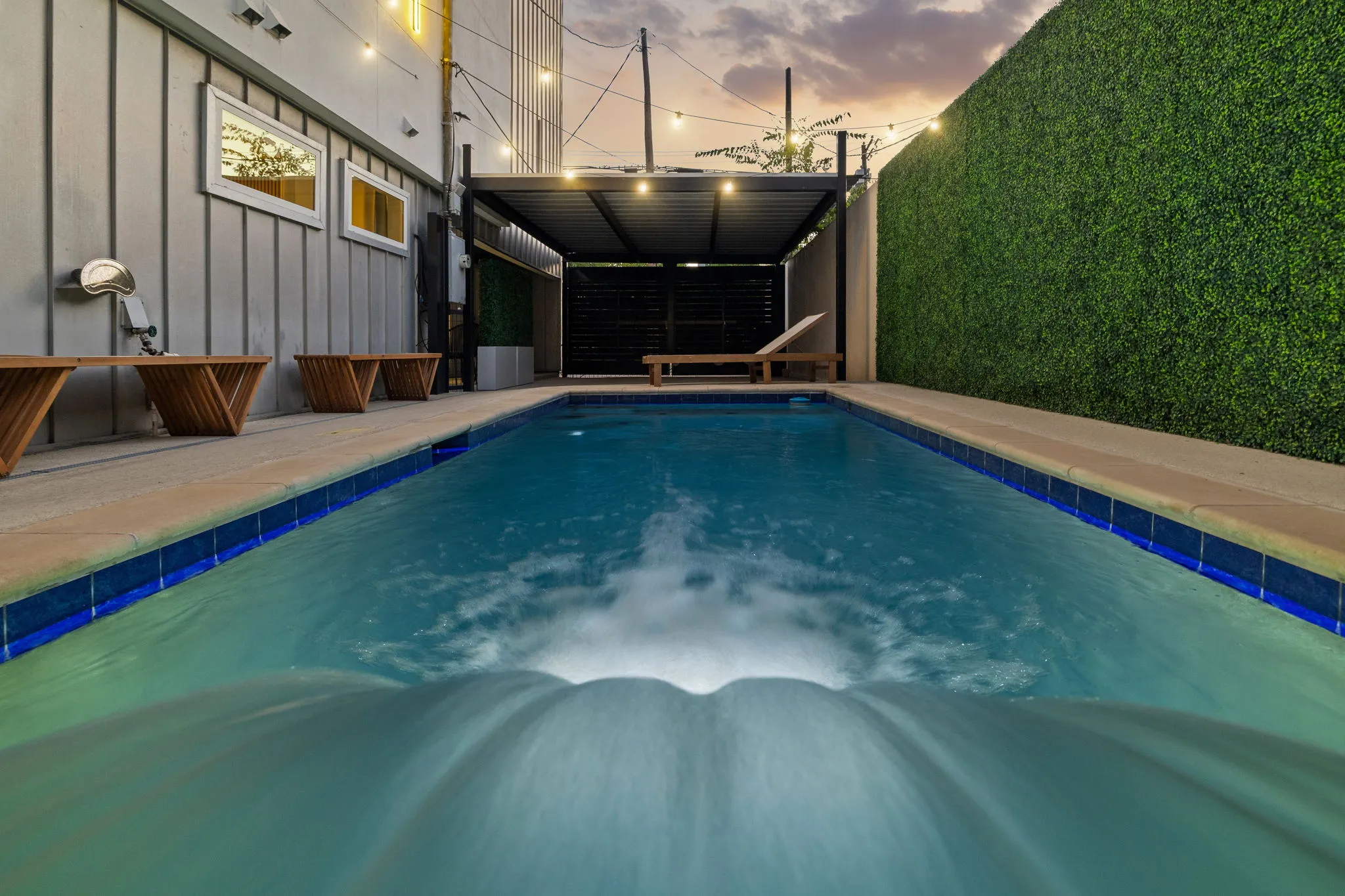 Pool area with string lights